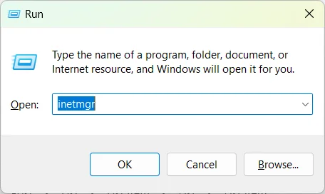Windows Run dialog typing inetmgr to open IIS Manager